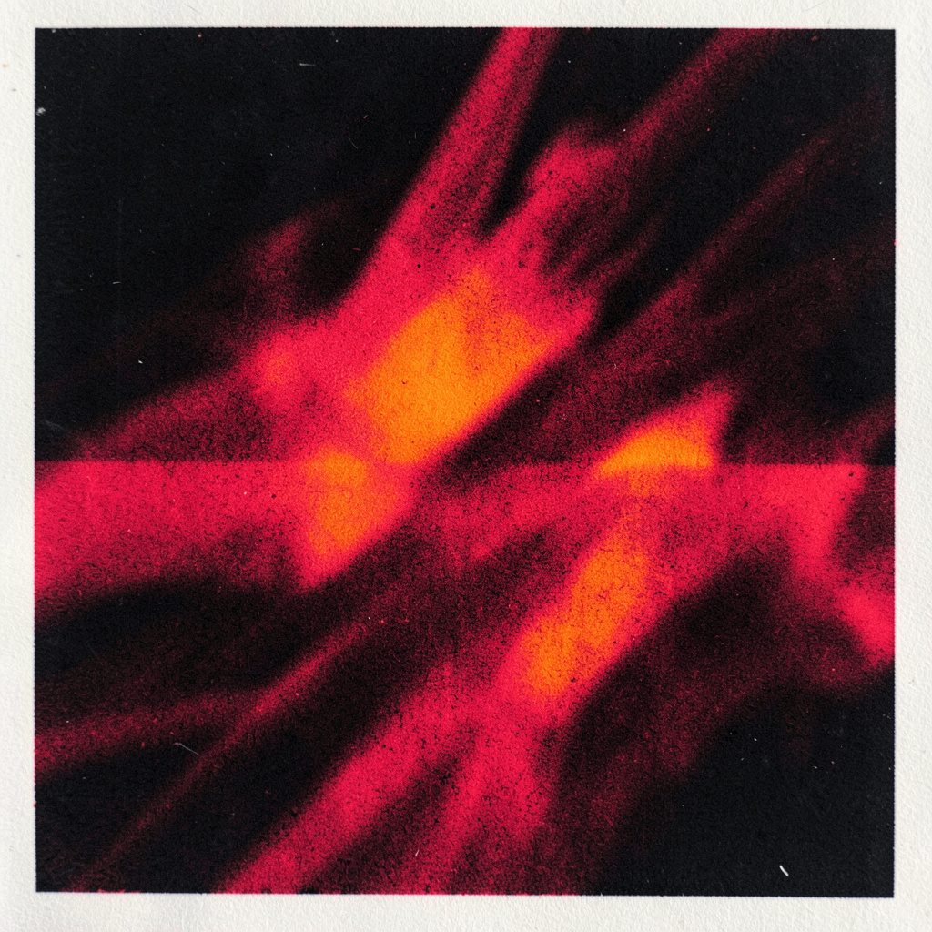 A two-ink risograph print in deep red and black, soft blurred forms suggesting motion and energy in a dark space.